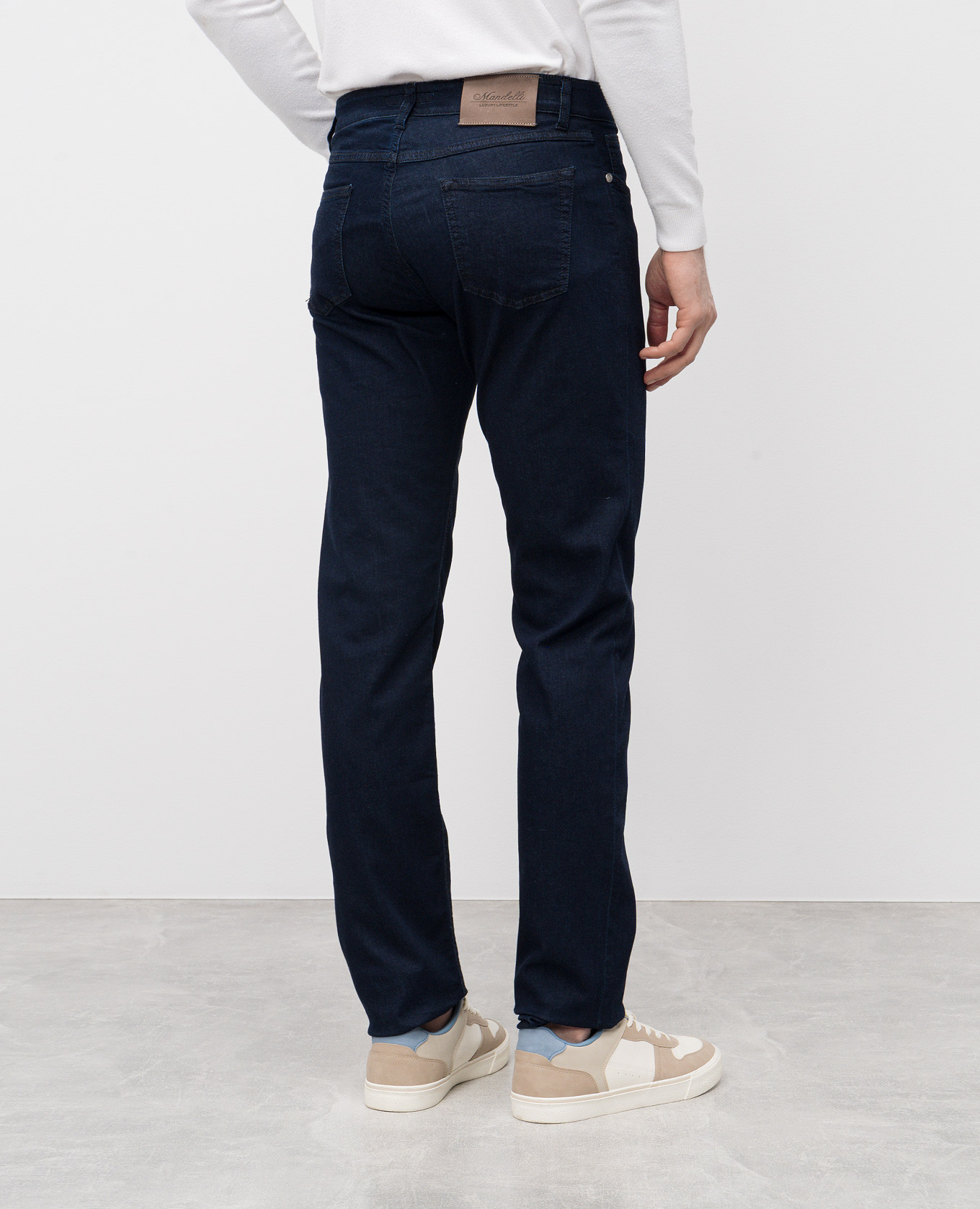 

Blue jeans with logo patch Enrico Mandelli