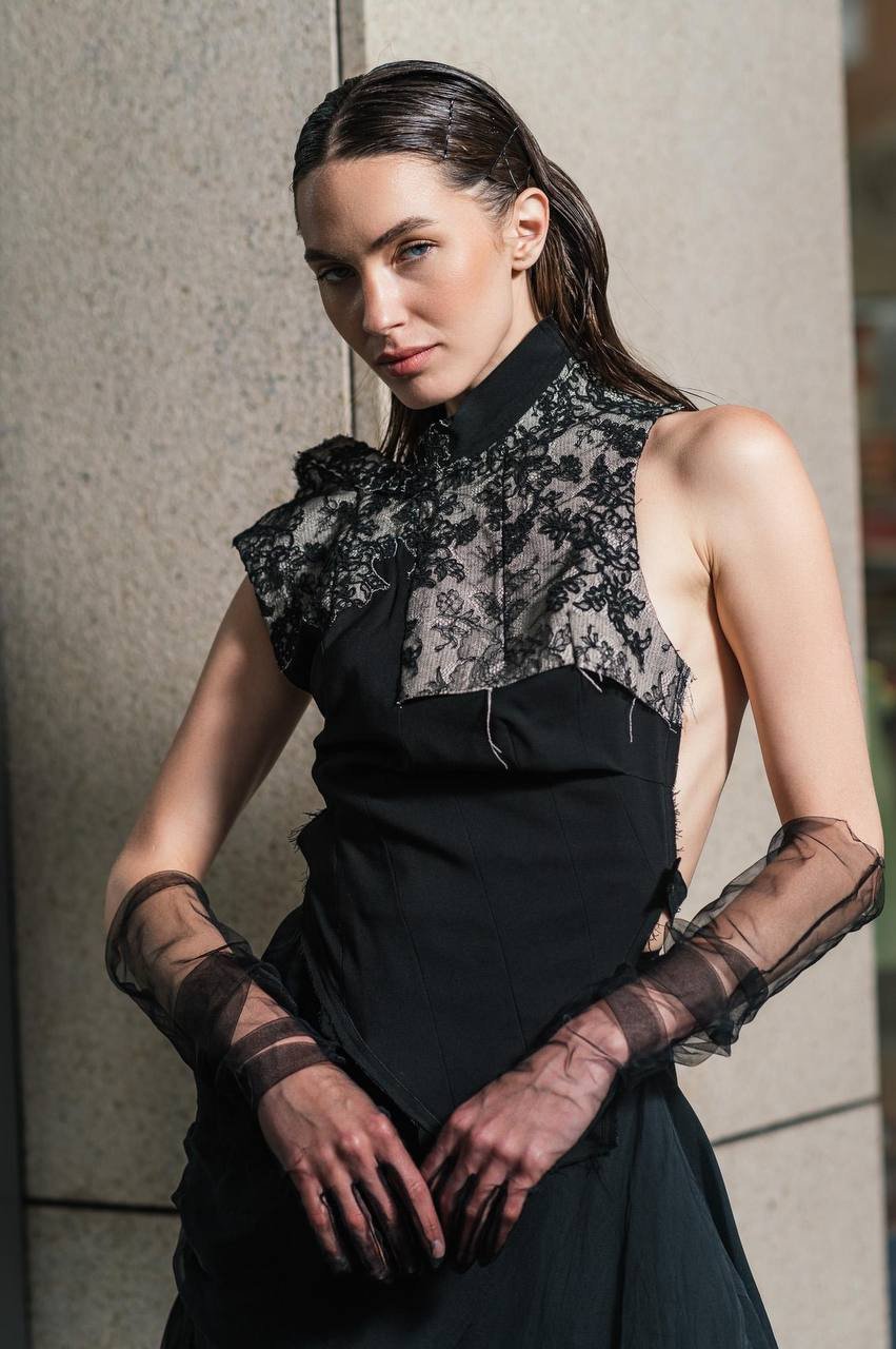 

Black wool lace top with open back Marc Le Bihan