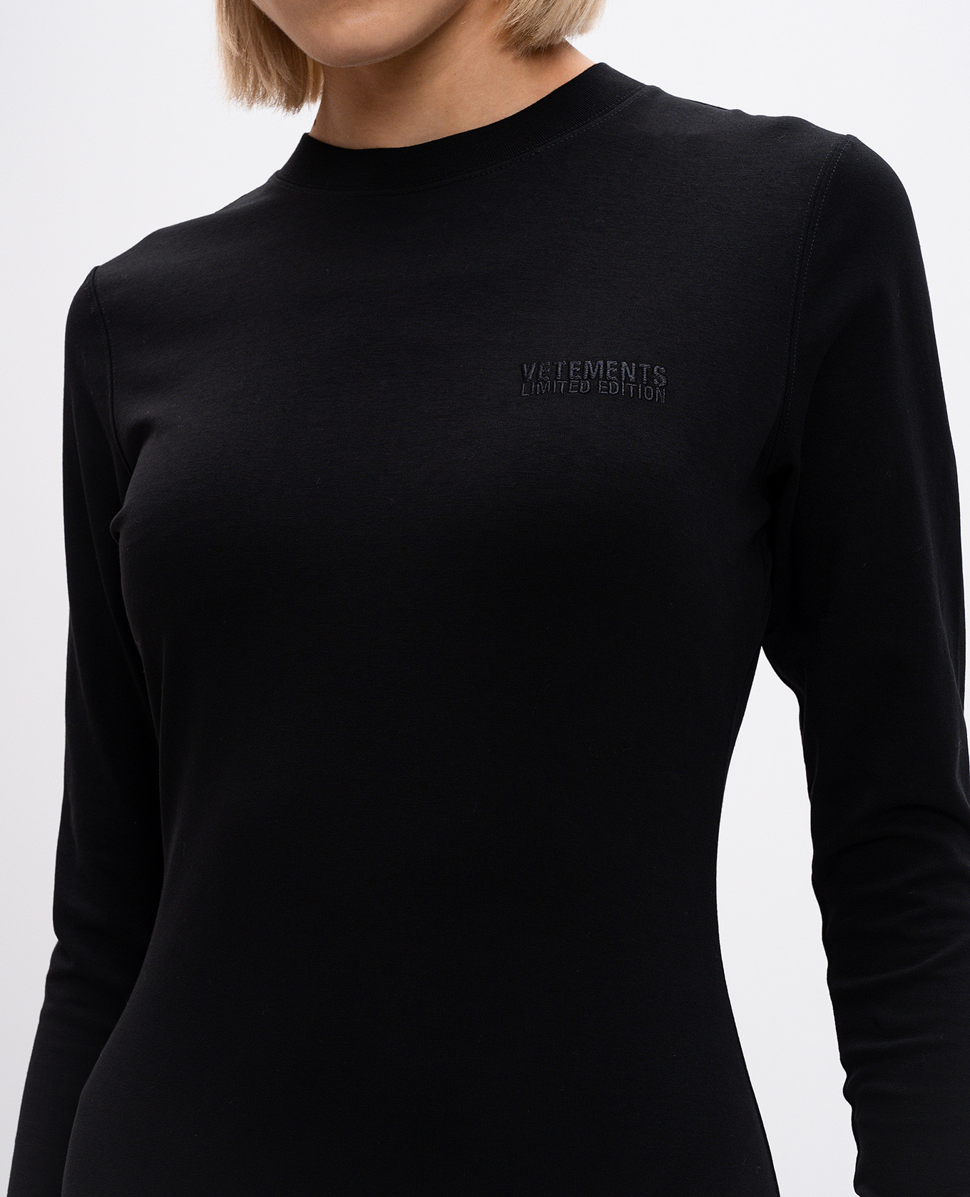 

Black maxi dress of asymmetric cut with logo Vetements
