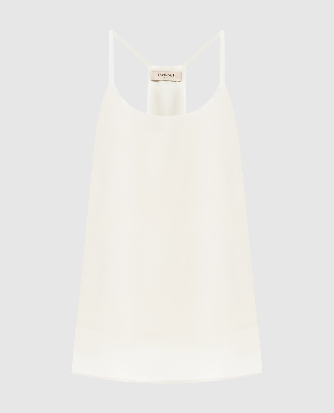 Beige top with metallic logo