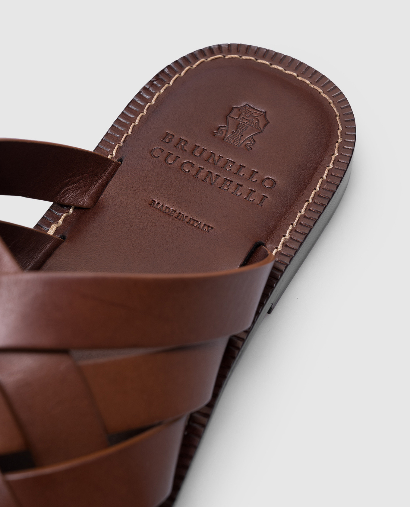 

Brown leather braided flip-flops Brunello Cucinelli