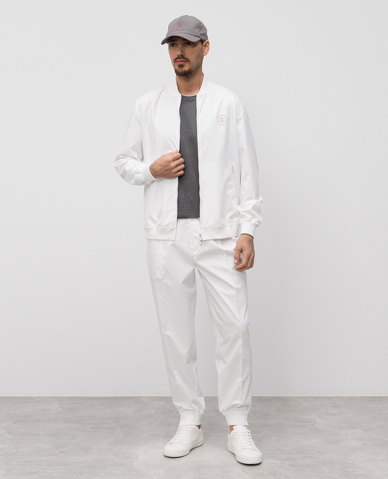 

White pants with emblem Brunello Cucinelli