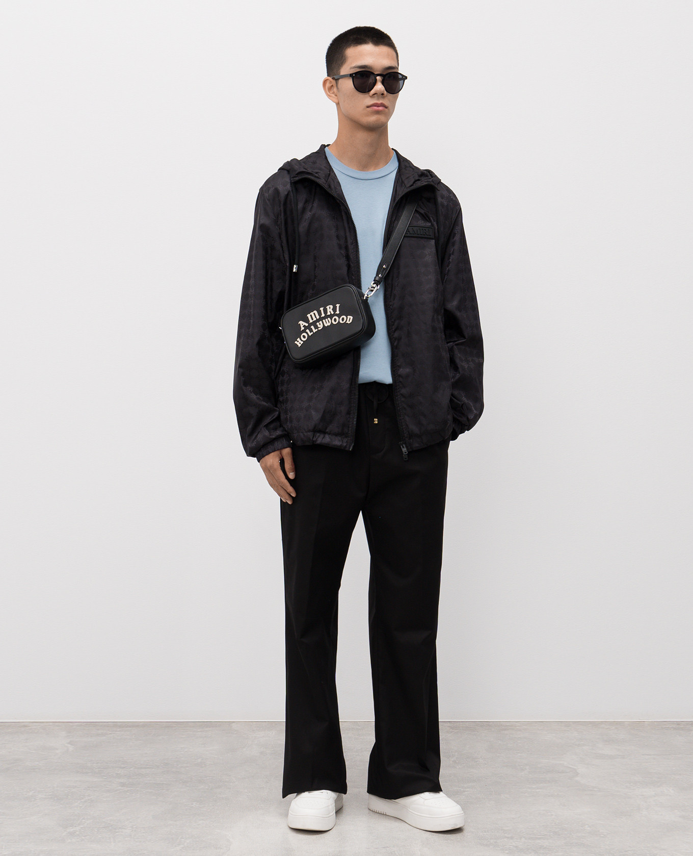 

Black windbreaker with monogram pattern AMIRI