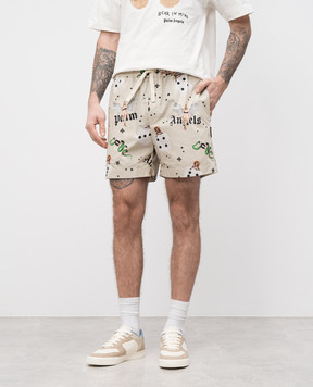 Palm Angels Beige shorts with a Pin up print PMCB034S25FAB003