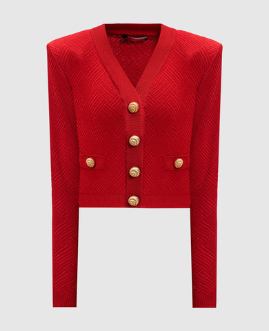Red cardigan in a woven geometric pattern