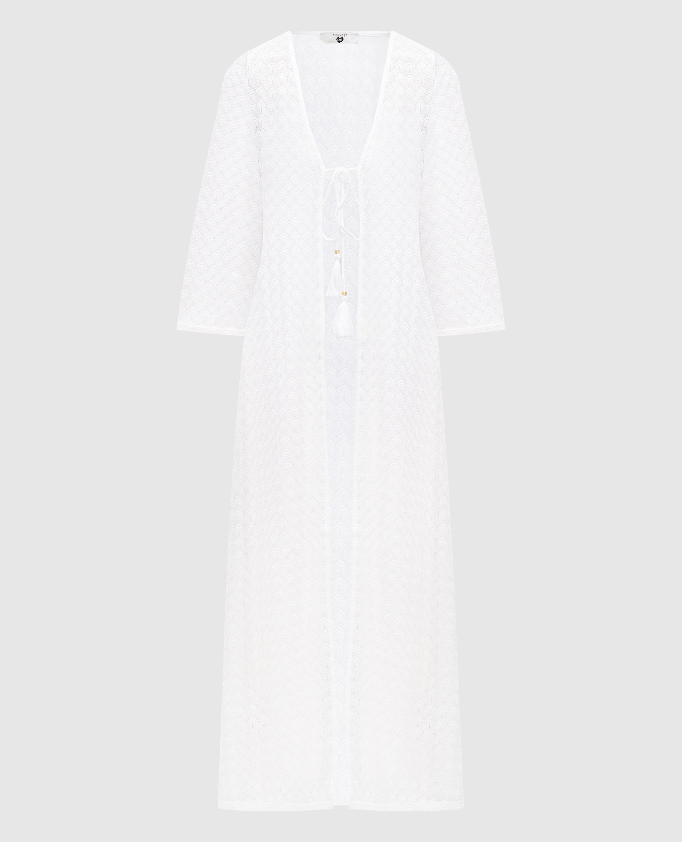 White cape with openwork pattern