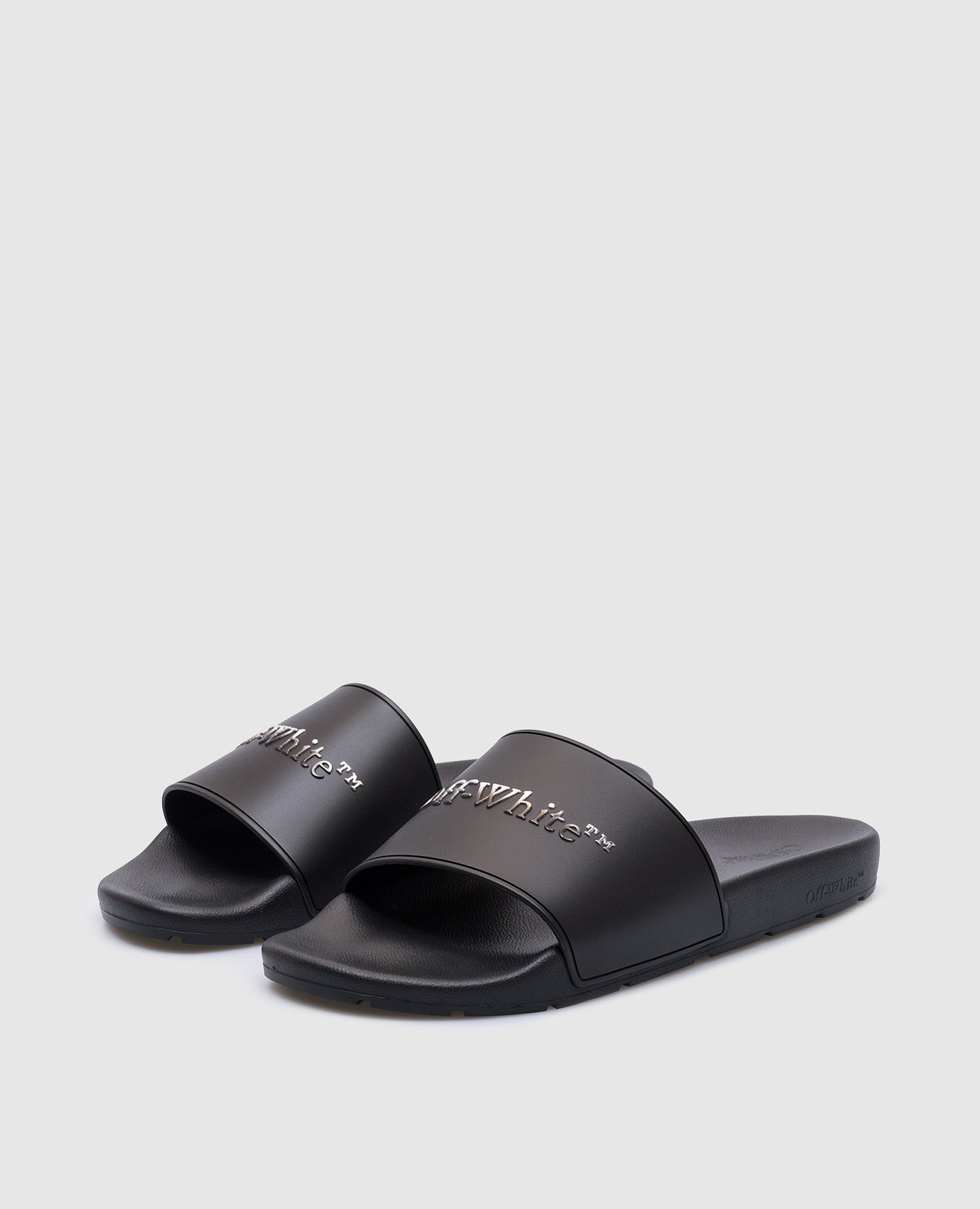 

Black sliders with textured logo Off-White