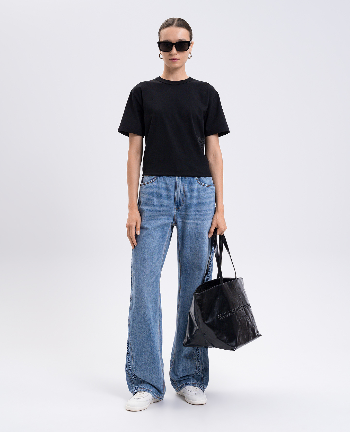 

Blue jeans with textured logo Alexander Wang