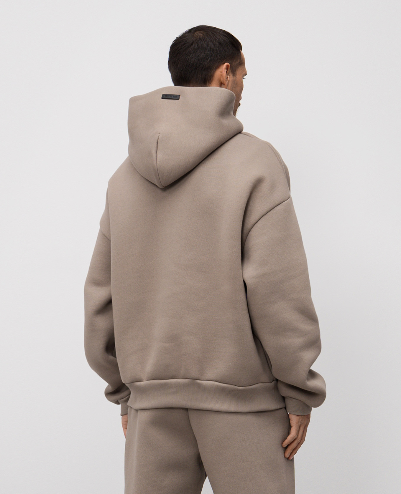 

Beige hoodie with textured brand print Fear of God