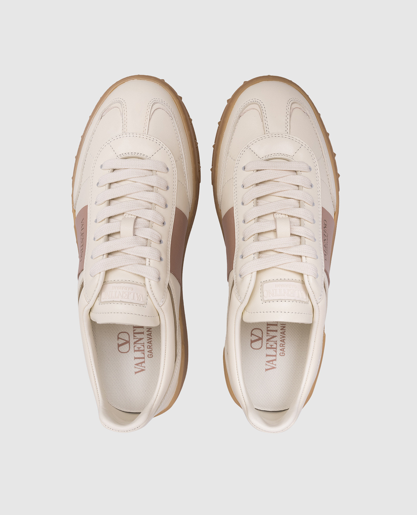 

Upvillage leather sneakers with logo patch in beige Valentino