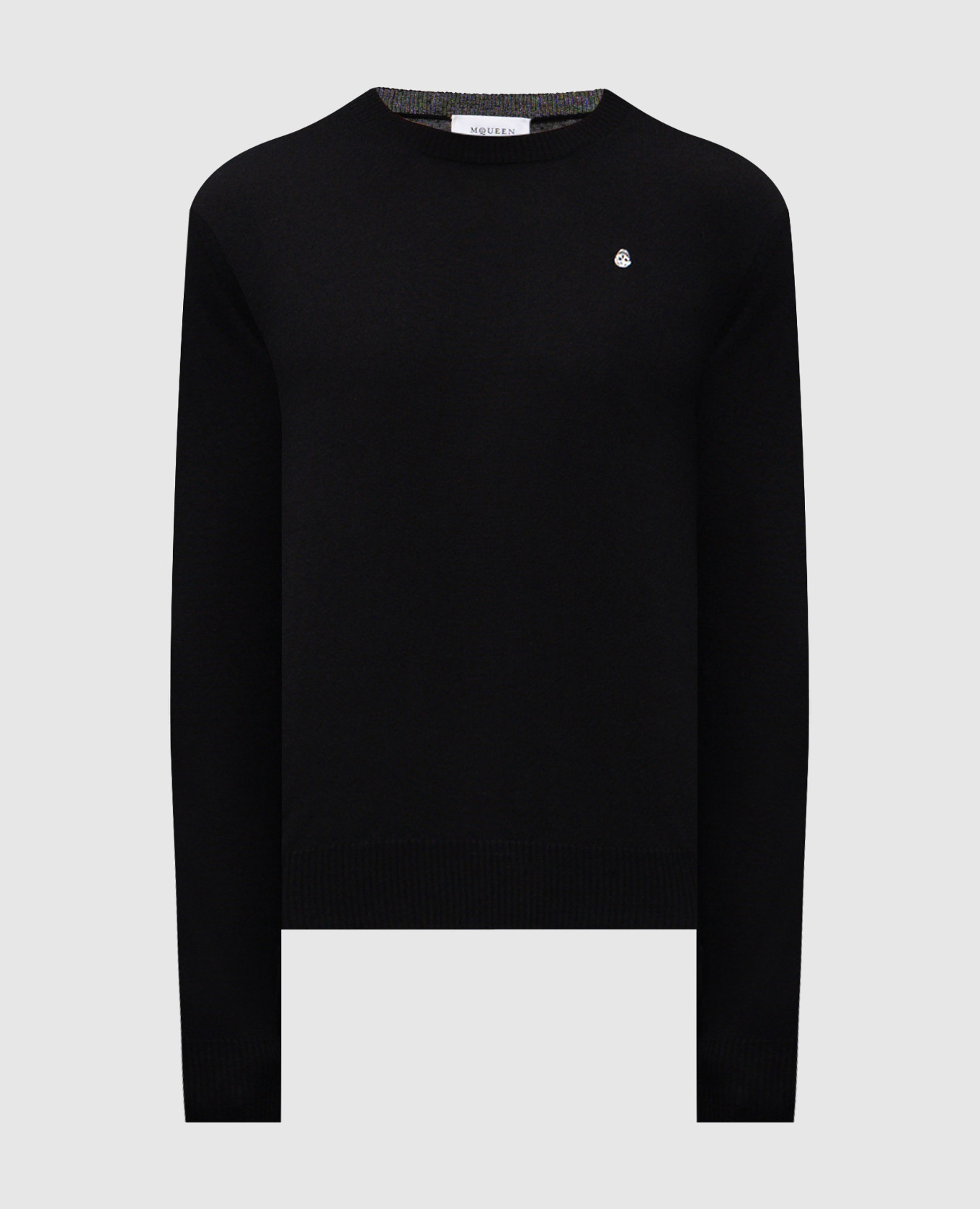 Black wool jumper with embroidered logo emblem