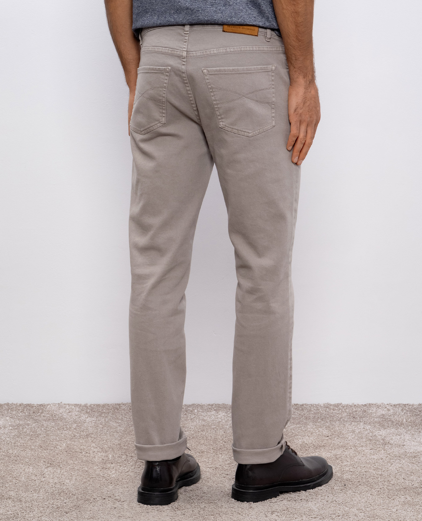 

Grey jeans with logo patch Brunello Cucinelli
