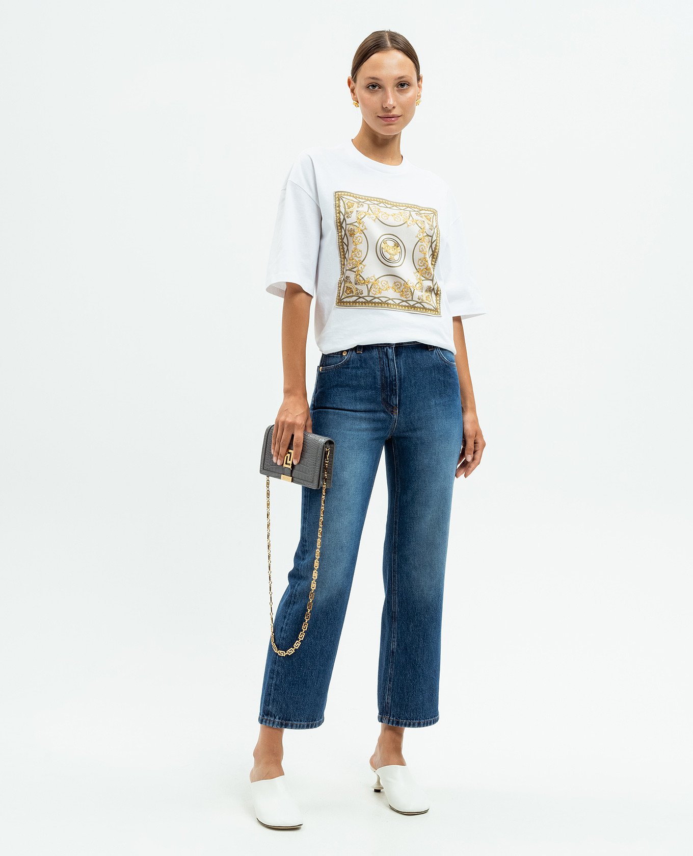 

Blue Medusa '95 jeans with distressed effect and logo patch Versace
