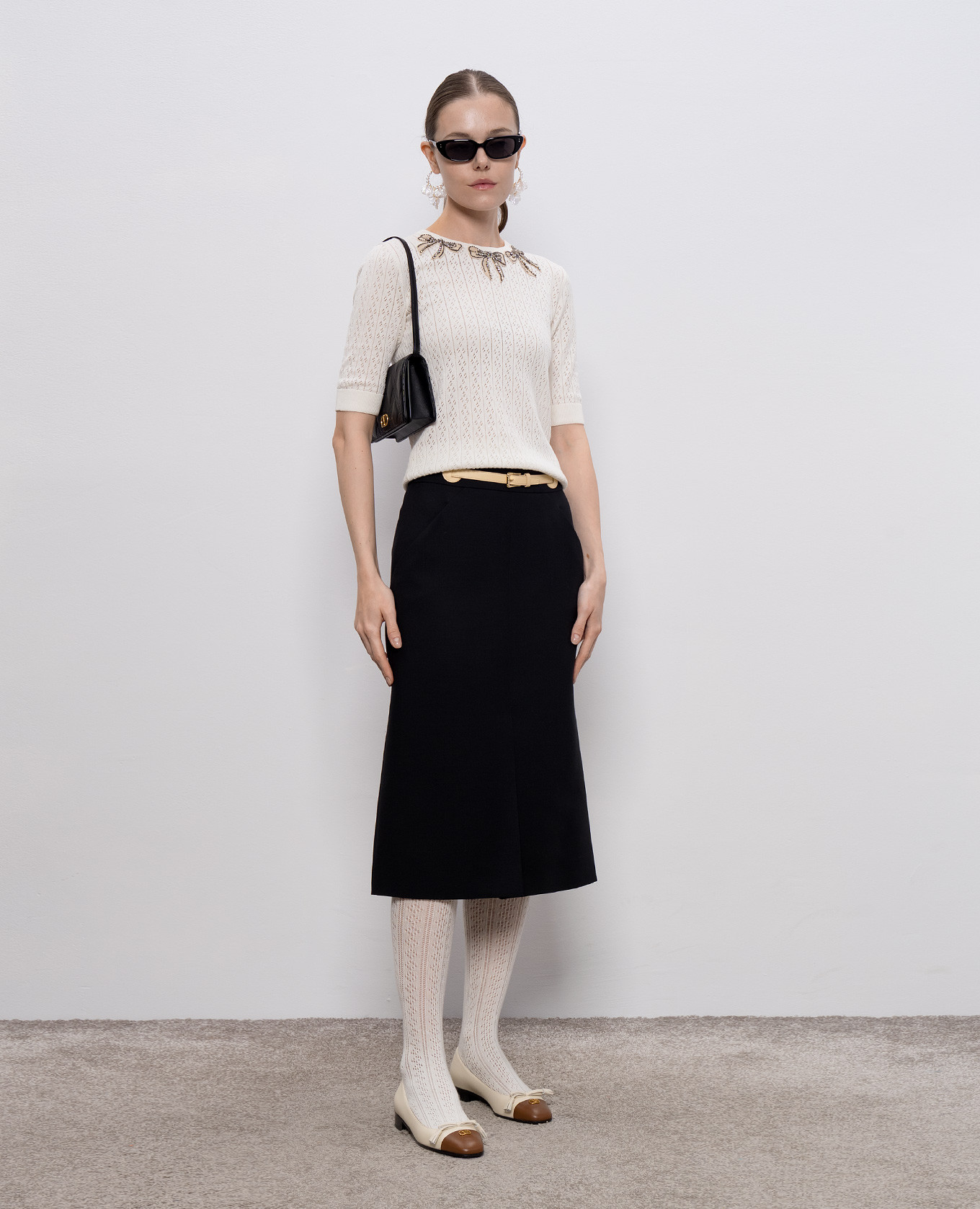 

Black wool and silk skirt Valentino