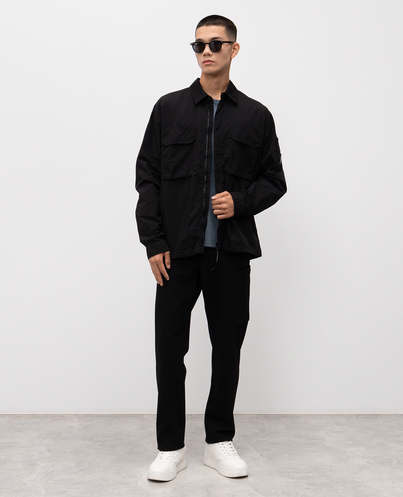 

Black jacket with logo patch C.P. Company