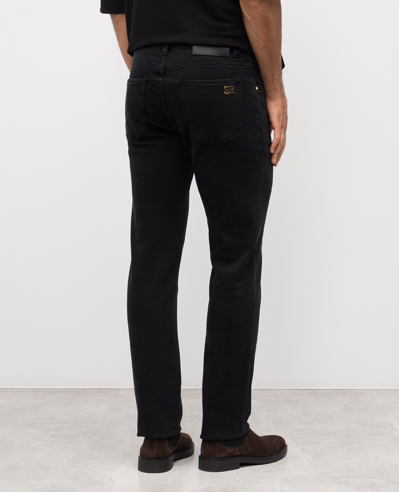 

Black jeans with logo patch Stefano Ricci