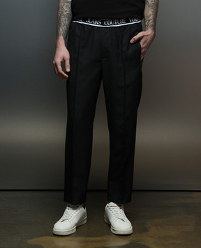 Versace Jeans Couture Black pants with a logo pattern 76GAA109N0309