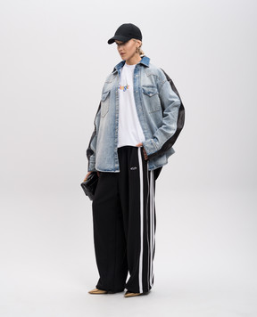 Vetements White T-shirt with a print of the inscription UA66TR700Ww