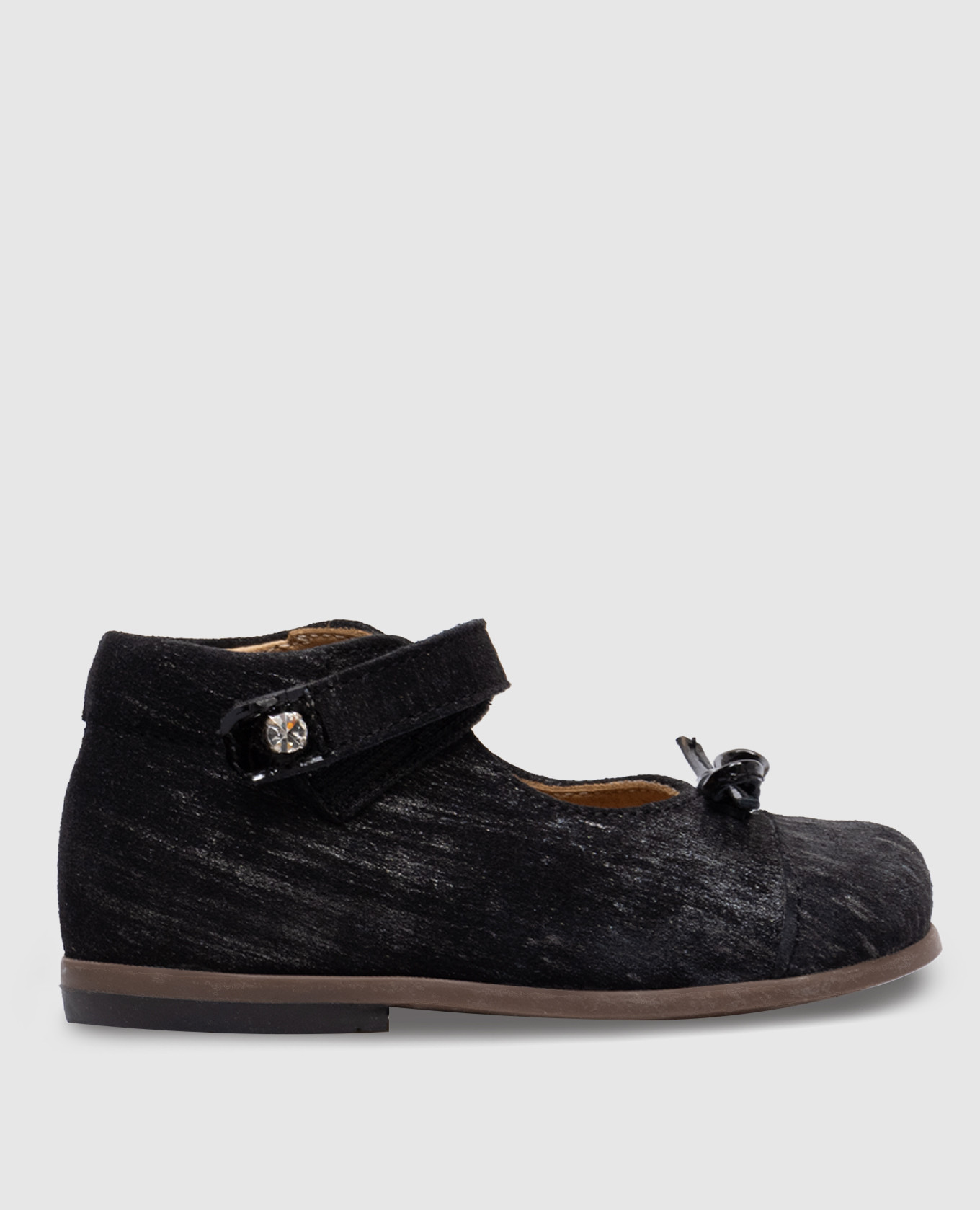 Children's black suede shoes with a bow