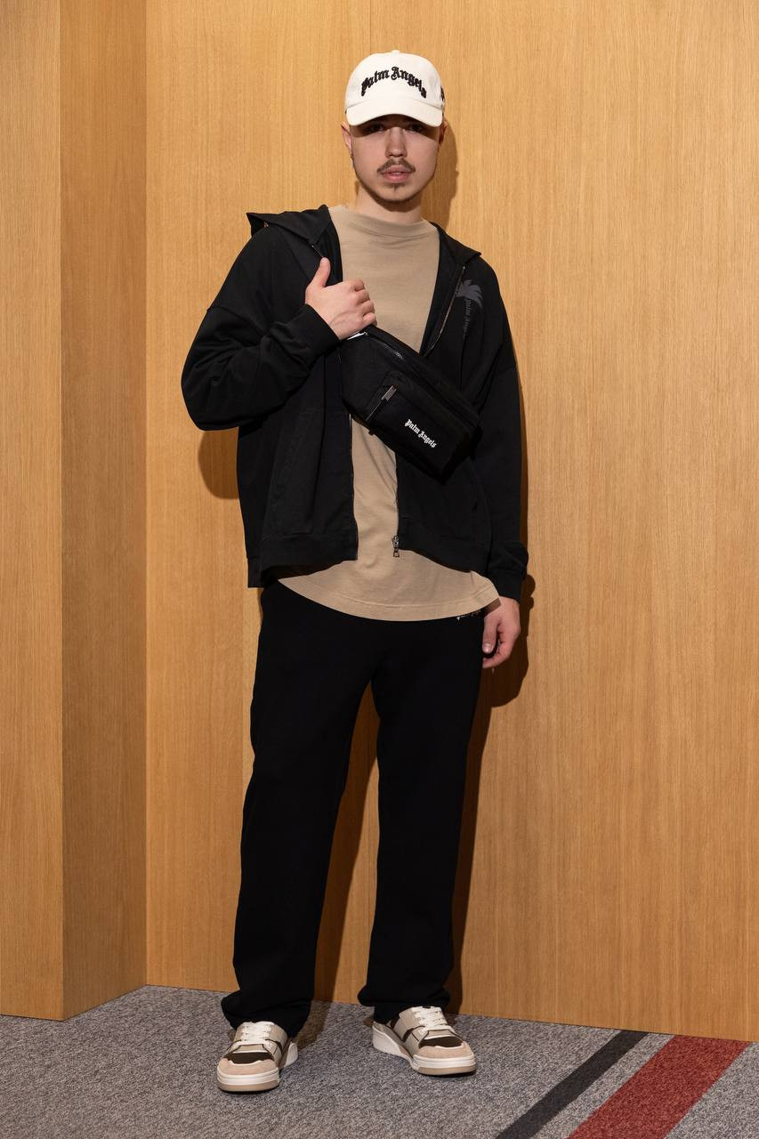 

Black sweatpants with contrasting logo embroidery Palm Angels