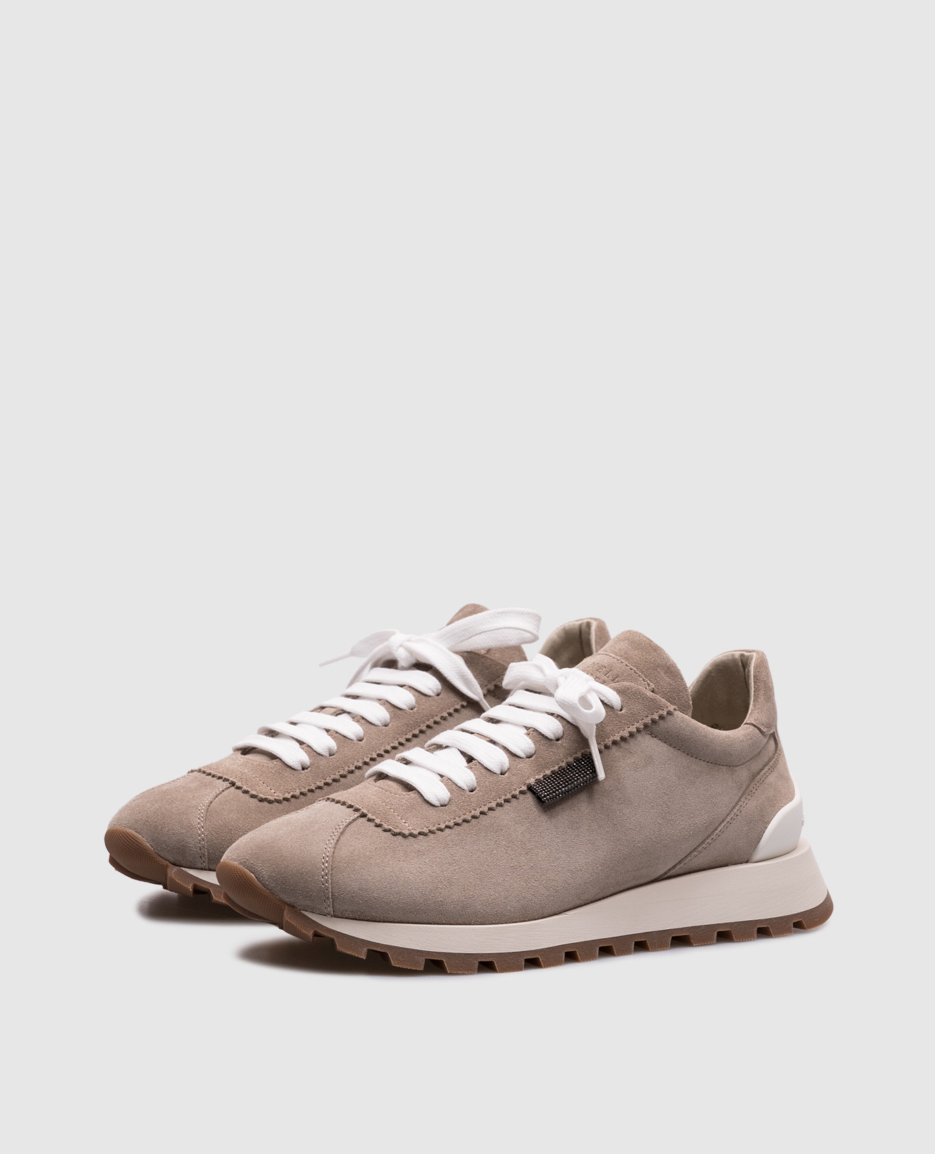 

Beige suede sneakers with a monil chain Brunello Cucinelli