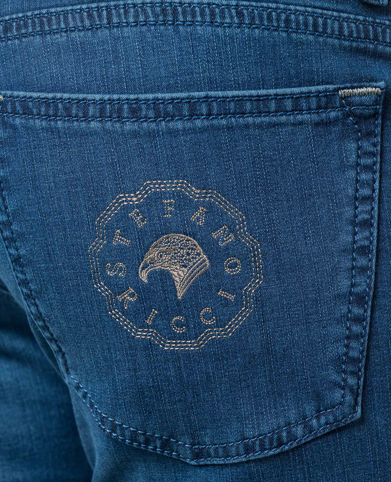 

Blue slim fit jeans with distressed logo embroidery Stefano Ricci