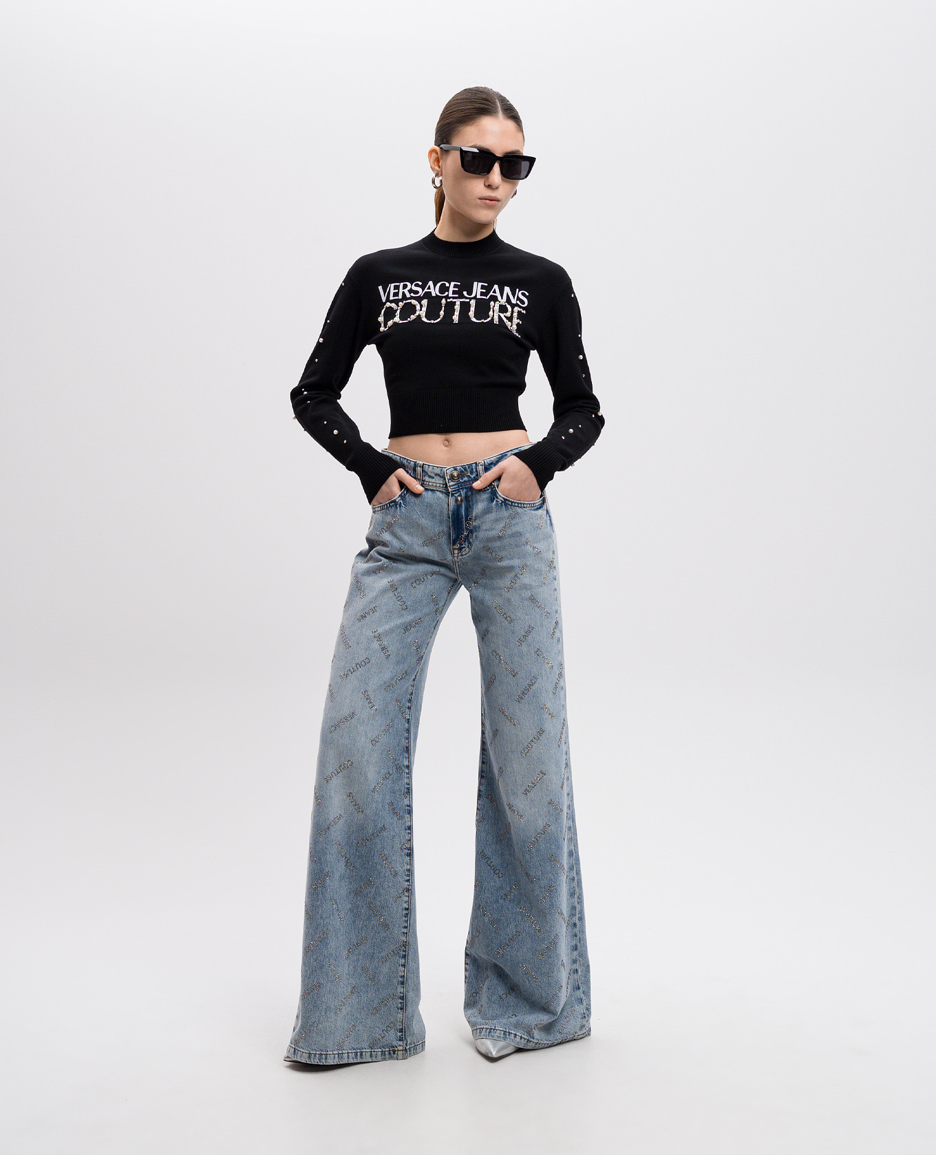 

Black cropped jumper with beaded logo embroidery Versace Jeans Couture