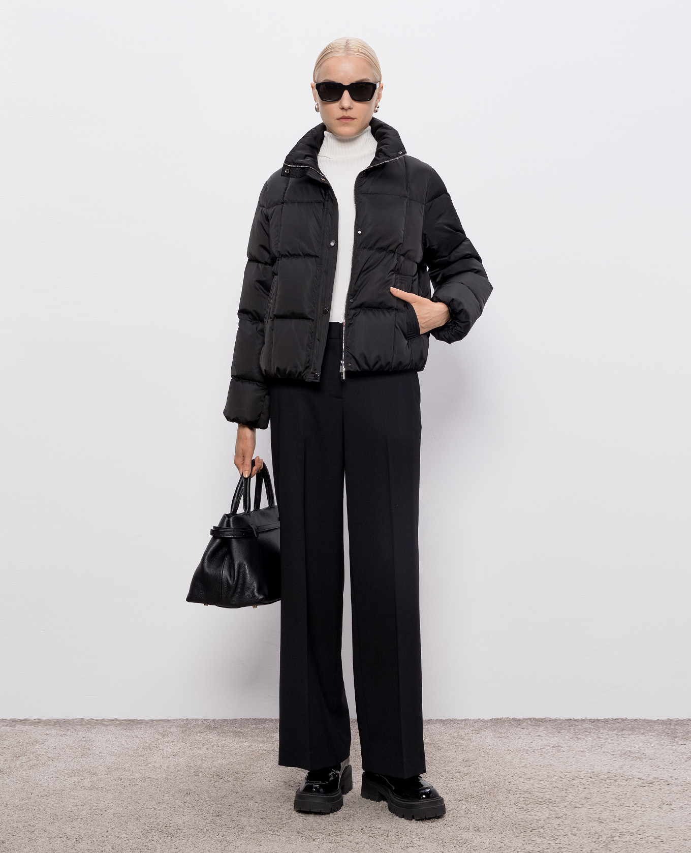 

Black down jacket with brand patch Peserico