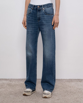 Brunello Cucinelli Blue jeans with leather logo patch MP114P4006