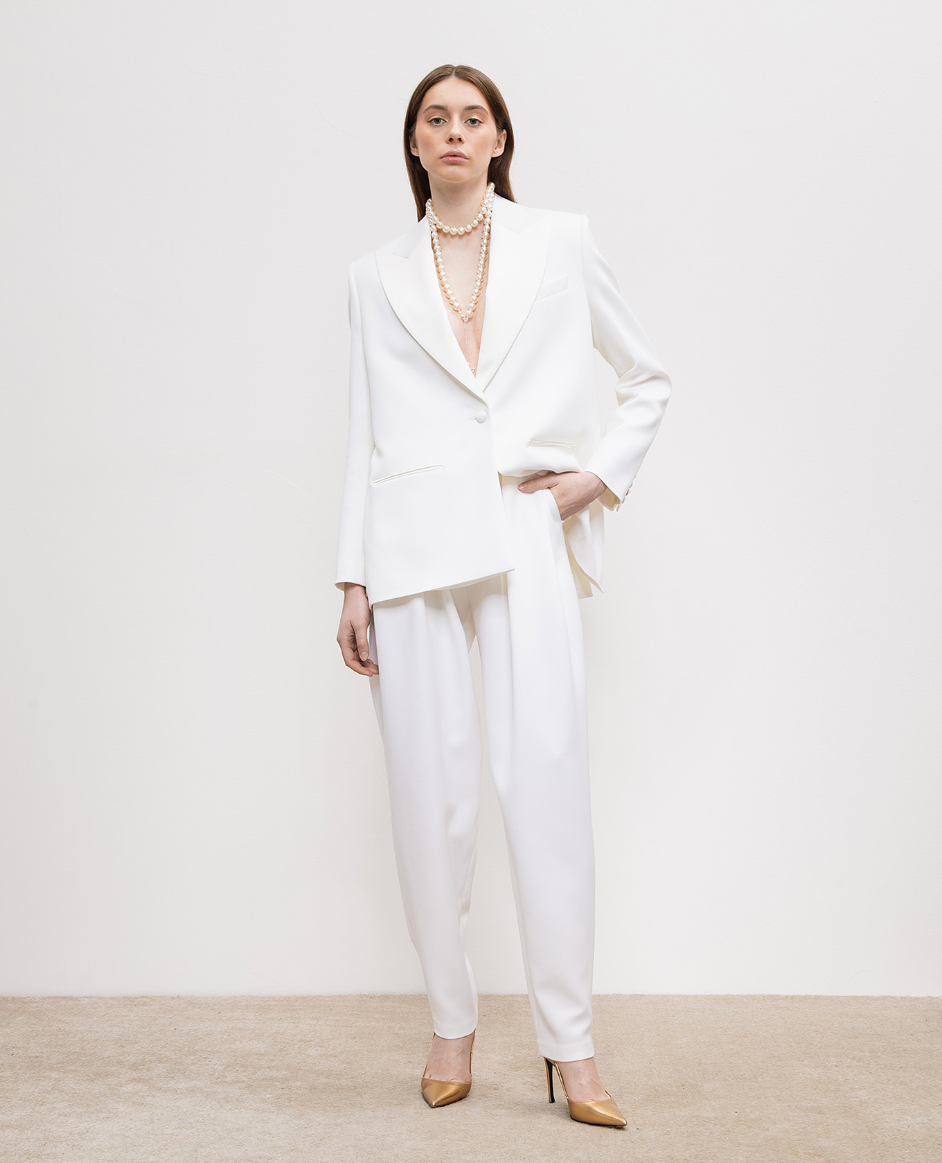 

White wool trousers with a high rise Magda Butrym