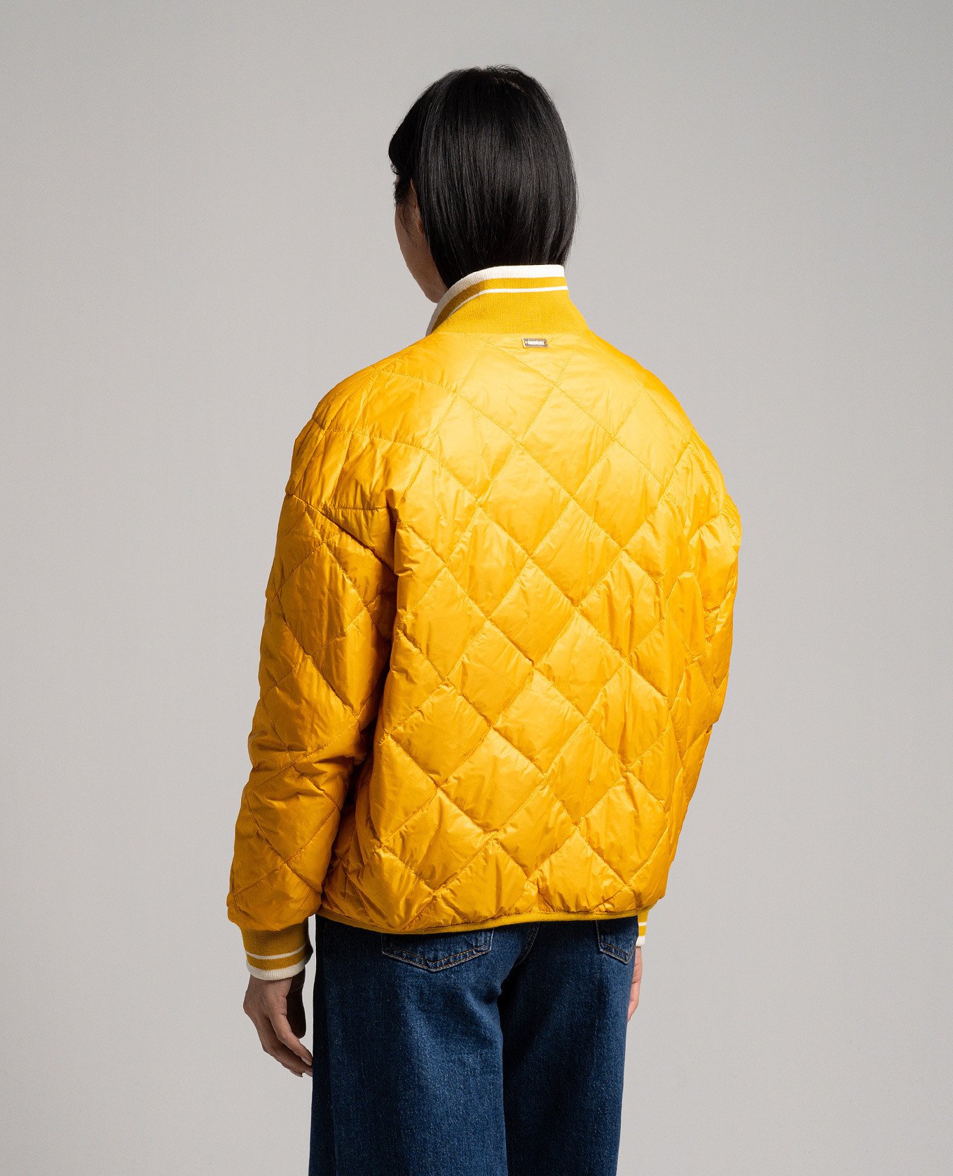 

Yellow quilted down jacket with metallic logo Stilnology