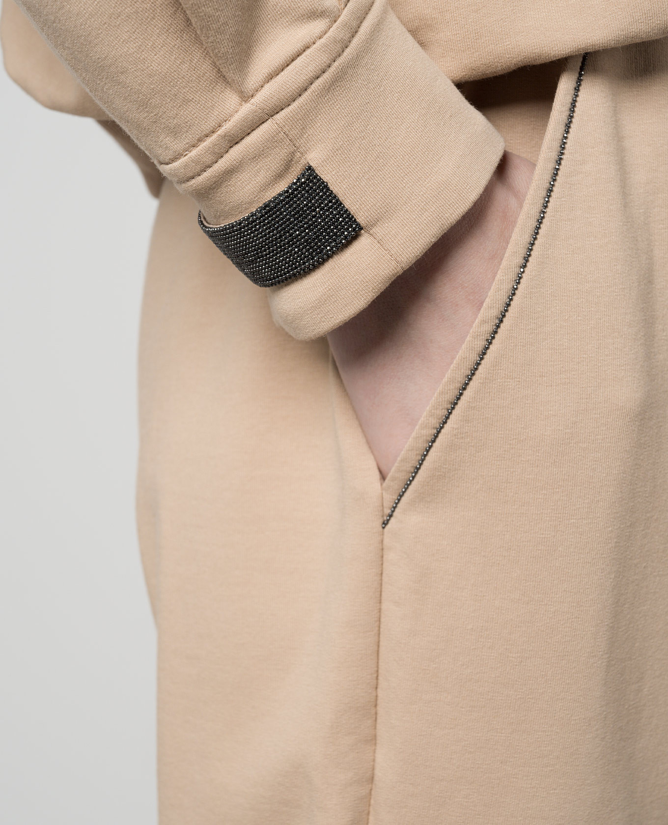

Beige sweatpants with monil chain Brunello Cucinelli