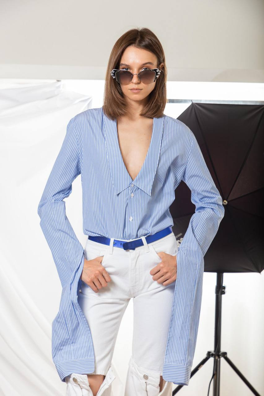 

Blue blouse with elongated sleeves in a stripe Coperni, Light blue