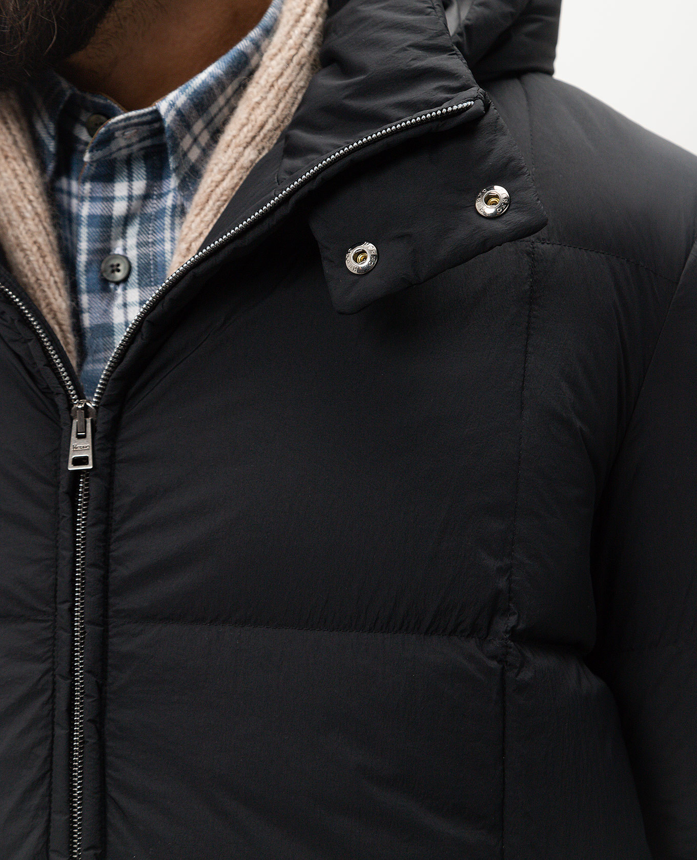 

Black puffer jacket with metallic logo Herno