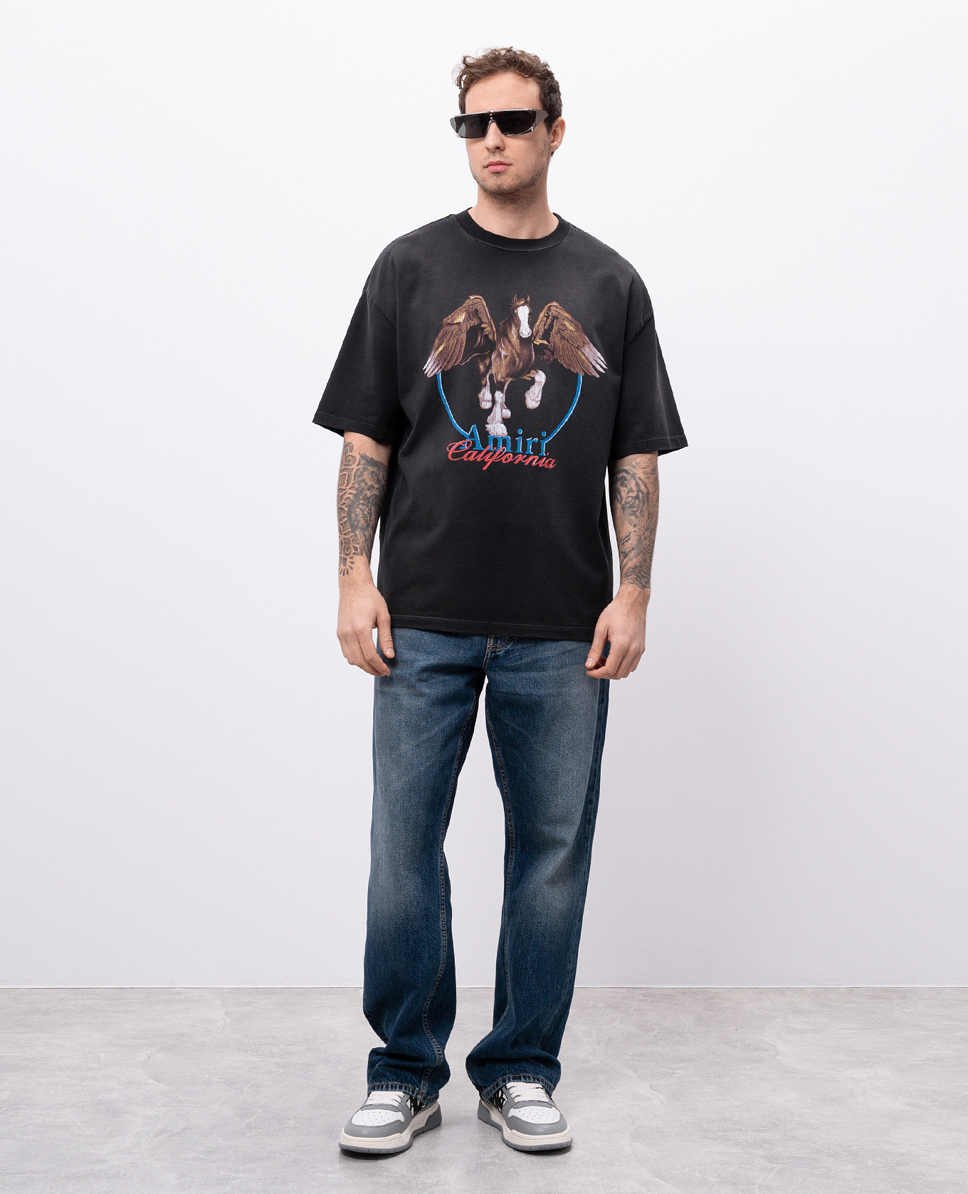 

Black WASH PEGASUS T-shirt with logo AMIRI