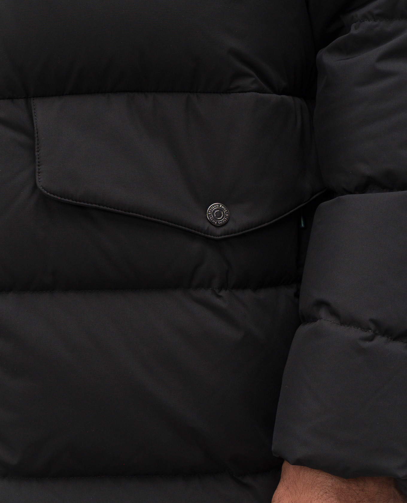 

Black down jacket with textured logo Stefano Ricci