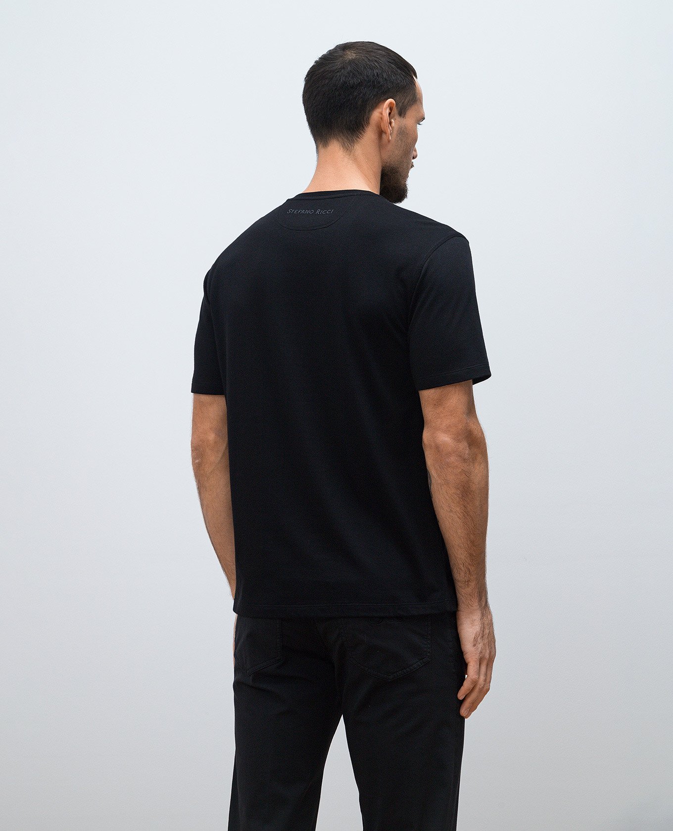 

Black T-shirt with textured logo emblem print Stefano Ricci