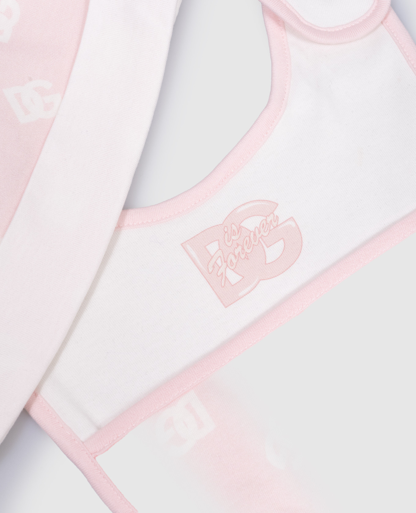 

Children's pink set of overalls, cap and bib in DG logo print Dolce&Gabbana