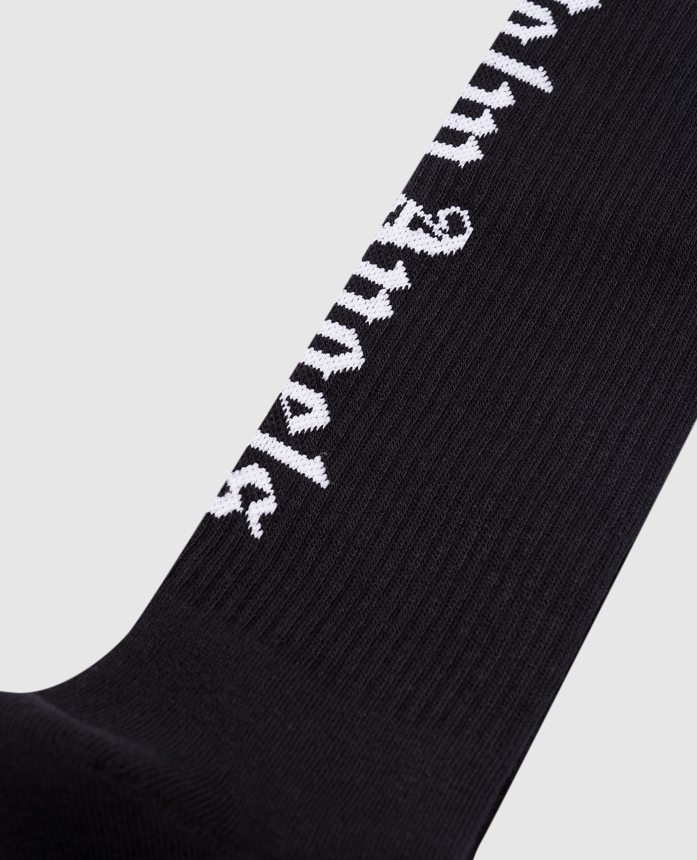 

Black socks with contrasting logo pattern Palm Angels