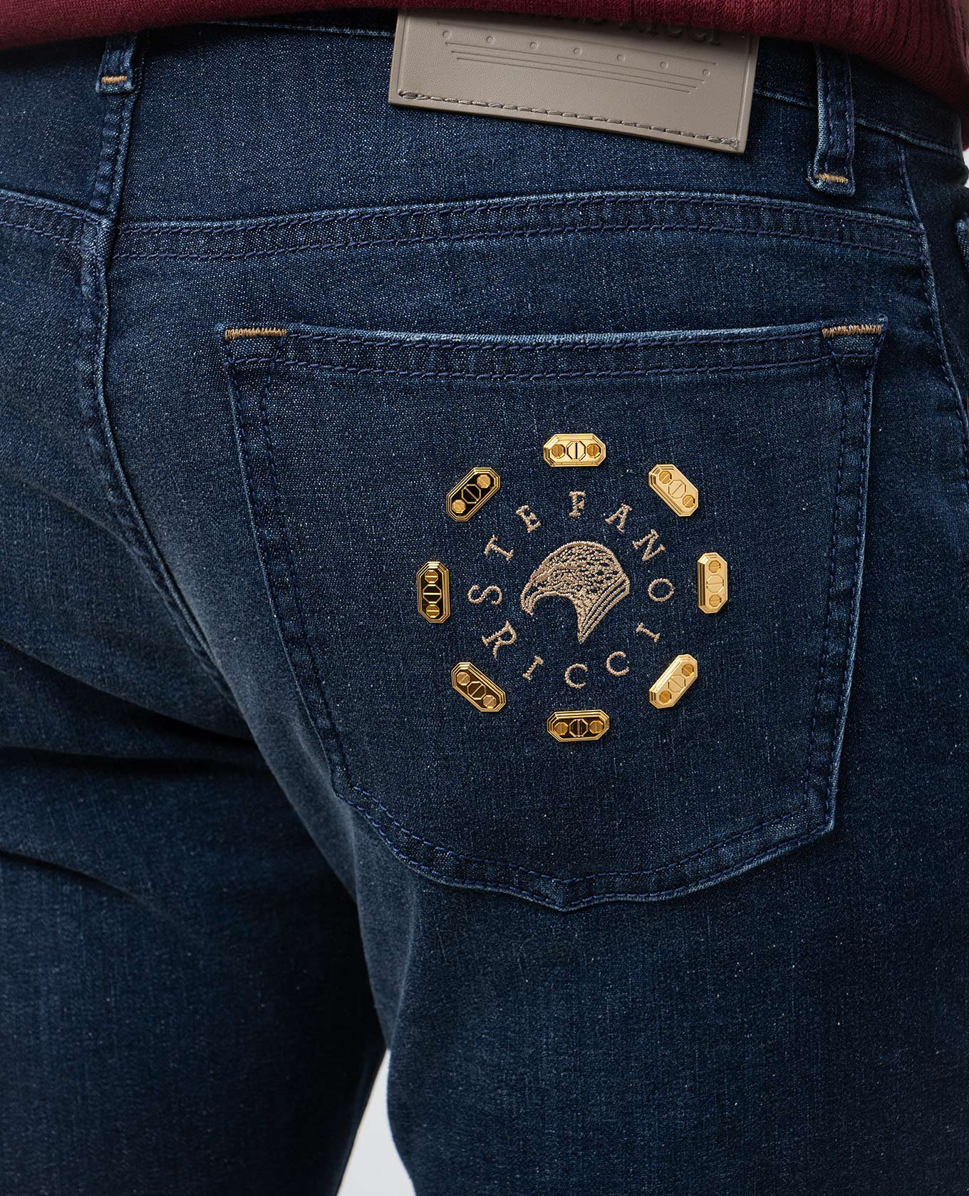 

Blue jeans with leather logo patch Stefano Ricci