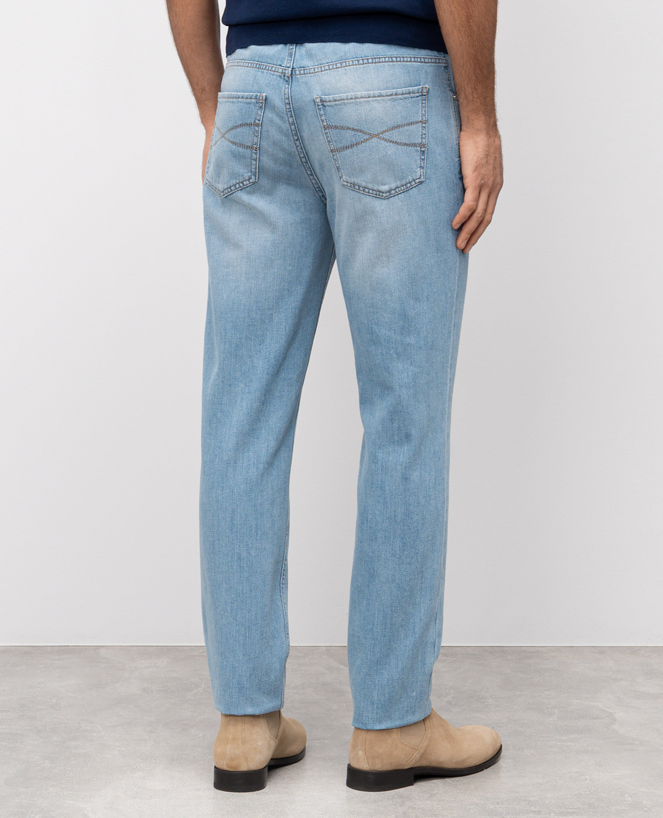 Blue jeans with leather logo patch Brunello Cucinelli 4