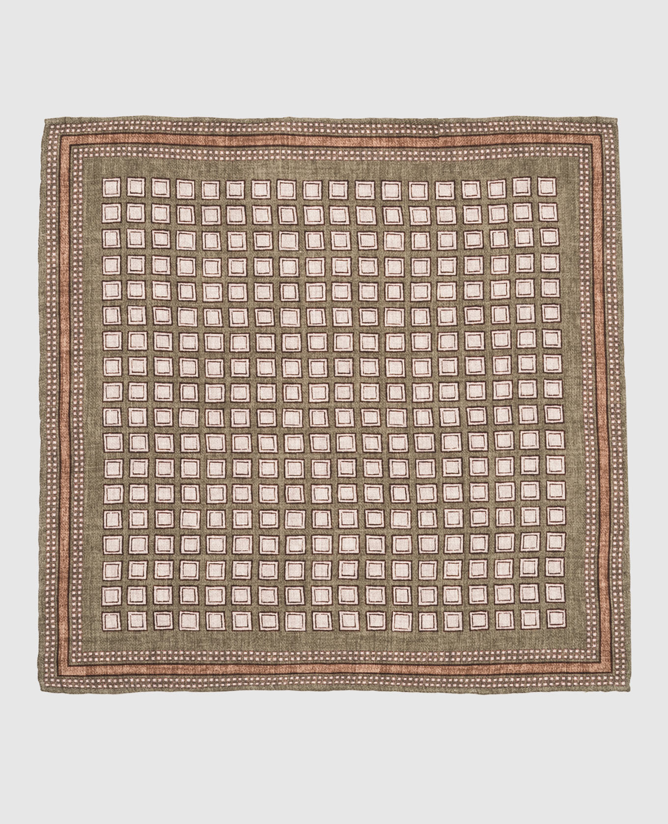 

A green pasha scarf made of silk in a geometric pattern Brunello Cucinelli