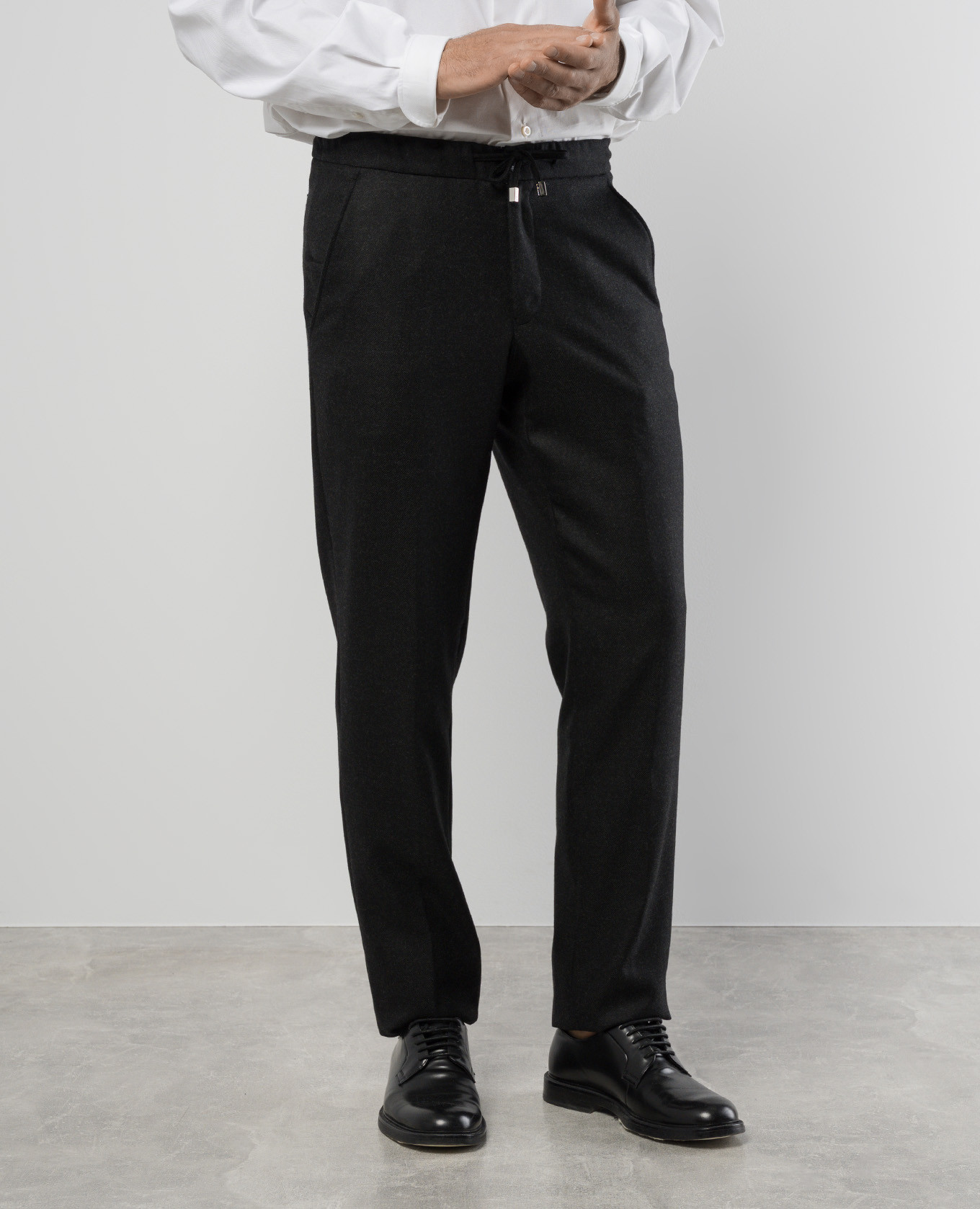 

Black wool trousers with logo engraving Enrico Mandelli