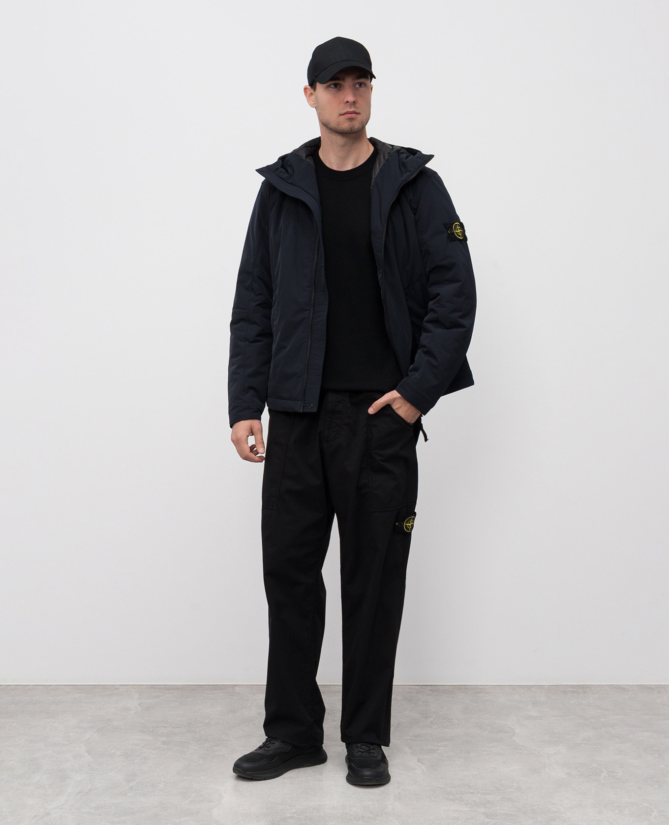 

Black wool jumper with logo patch Stone Island