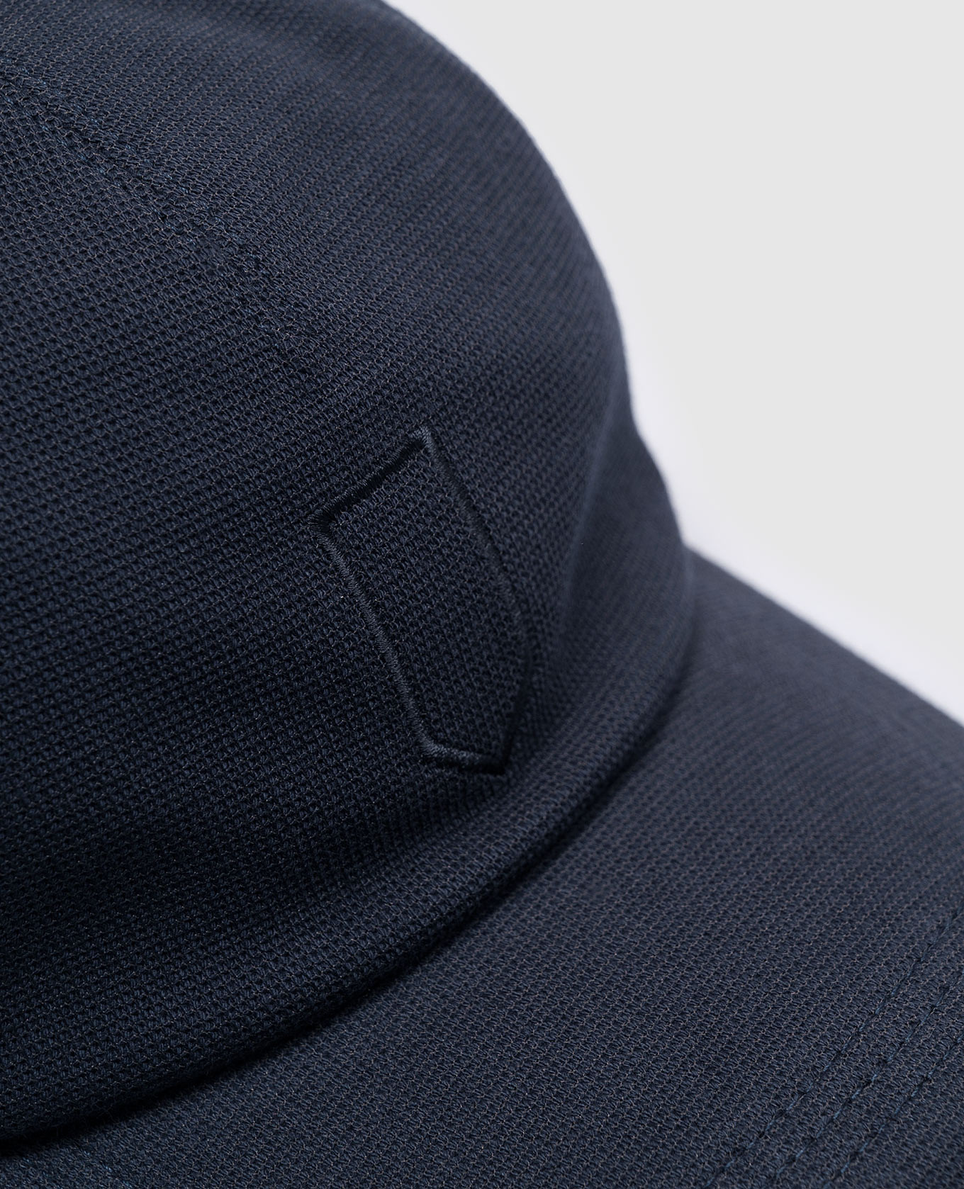 

Blue cap with embroidery Canali